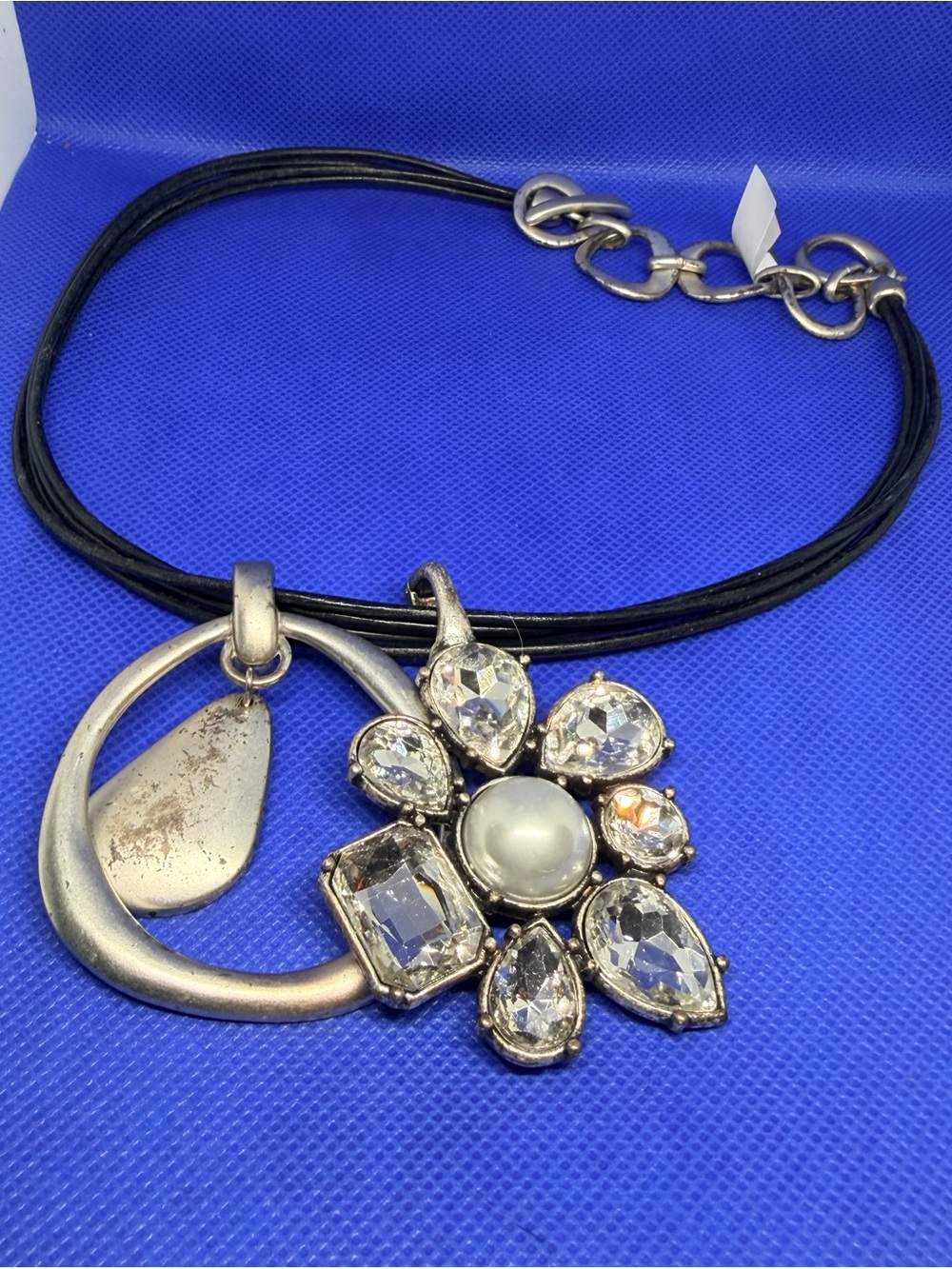 Silver Flower Pendant Necklace with Black Cord and Clear Accents